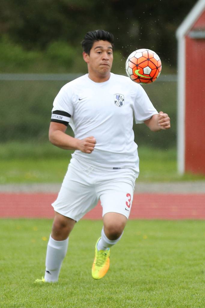 Uriel Liquidano keeps his eye on the ball for Coupeville. (Photo by John Fisken)