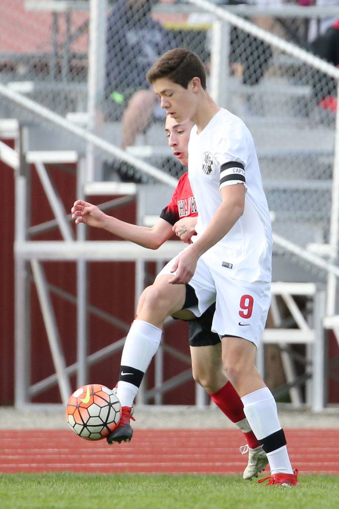 William Nelson takes control in front of a Red Hawk defender. (Photo by John Fisken)