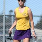 Maddie McKenzie keeps her eye on the ball on the way to winning fourth singles. (Photo by John Fisken)