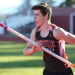 Mitchell Carroll, winner of he pole vault, heads down the runway. (Photo by John Fisken)