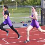 Oak Harbor&rsquo;s Ozell Jackson, left, and Mac Nuanez head down the backstretch in the 400 meters. Nuanez finished first and Jackson third. (Photo by John Fisken)