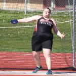 Skyler Lawrence tosses the discus for the Wolves. (Photo by John Fisken)