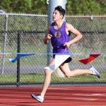 Mike Lym works for second place in the 800 meters. (Photo by John Fisken)