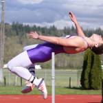 Kyle Nickols takes first in the high jump. (Photo by John Fisken)