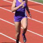 Amaya Rittierodt sprints to second place in the 100 meters. (Photo by John Fisken)