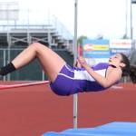 Kristina Tirado clears the bar in the high jump. She placed second in the event Thursday. (Photo by John Fisken)