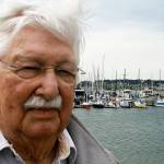 Jim McAlpine is the oldest participant in Oak Harbor Yacht Club&rsquo;s weekly sailing races. Going on 88, his passion for sailing has led him on a lifetime of adventures. Photo by Daniel Warn/Whidbey News-Times