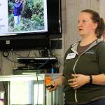Jessica Larson, land steward for the Whidbey Camano Land Trust, speaks to residents near Crockett Lake Thursday, April 27, 2017, about a plan to eradicate noxious weeds near the lake over the next three years. The main culprit is hairy willow-herb, which grows on more than 100 acres near Crockett Lake, making it the worst infestation in Washington state. Photo by Ron Newberry/Whidbey News-Times