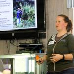 Jessica Larson, land steward for the Whidbey Camano Land Trust, speaks to residents near Crockett Lake Thursday, April 27, 2017, about a plan to eradicate noxious weeds near the lake over the next three years. The main culprit is hairy willow-herb, which grows on more than 100 acres near Crockett Lake, making it the worst infestation in Washington state. Photo by Ron Newberry/Whidbey News-Times