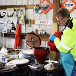 Old gasoline that had sat on a boat for eight years is poured into a barrel by John Vance who handles household hazardous waste at the Coupeville Solid Waste Complex. Photo by Patricia Guthrie/Whidbey News-Times