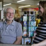 Eugene Phelps, owner of Gene&rsquo;s Art & Frame, in his Oak Harbor store Thursday, May 4, 2017 along with store manager Linnane Armstrong. Phelps has been in business for 50 years. The store is celebrating its 50th anniversary in June. Photo by Ron Newberry/Whidbey News-Times.