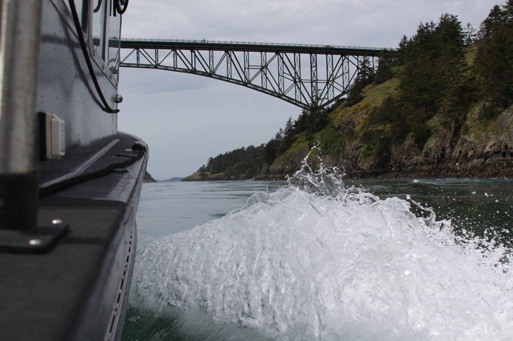 An outing with Washington Department of Fish and Wildlife reveals the horsepower of patrol boat No. 10 as it heads toward Deception Pass Wednesday, May 10, 2017. Photo by Ron Newberry/Whidbey News-Times