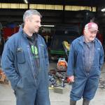 Bob Engle, left, and his uncle, Len Engle, at the garage on the grounds of the former dairy farm and homestead. The Engle family, farmers since the 1850s, switched to raising beef cattle about six years ago.