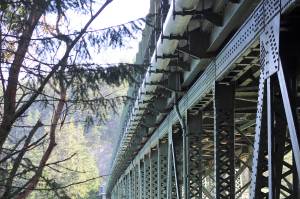 Photo by Jessie Stensland/Whidbey News-Times                                A project to replace the hangers on a water pipe under Deception Pass Bridge will take longer than expected.