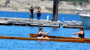 Photos by Patricia Guthrie/Whidbey News-Time                                Competitors cross paths in the single woman race during Saturday&rsquo;s Penn Cove Water Festival. Canoe races ranged from one person to 11-person crews.