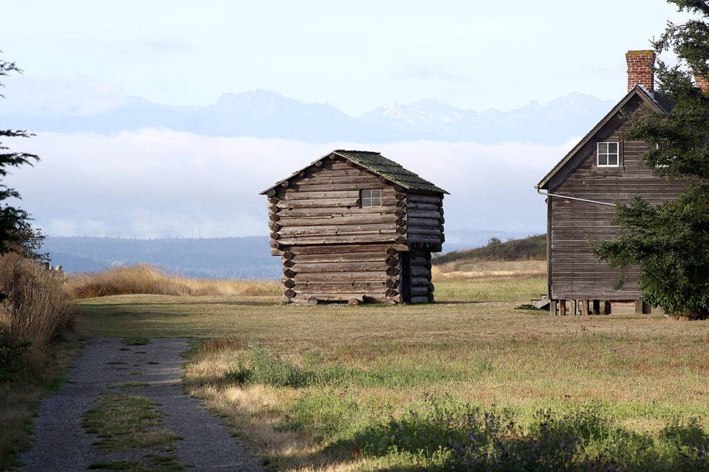 The Ebey blockhouse, left, and Jacob Ebey House at Ebey&rsquo;s National Historical Reserve, pictured in 2016. Photo by Ron Newberry/Whidbey News-Times