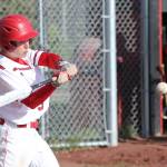 Matt Hilborn attacks a high pitch Monday. (Photo by John Fisken)