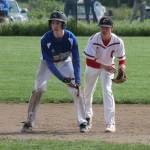 Coupeville shortstop Matt Hilborn keeps a Viking runner close at second base. (Photo by Jim Waller/Whidbey News-Times)