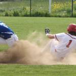 Clay Reilly steals second base for the Wolves. (Photo by Jim Waller/Whidbey News-Times)