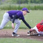 Coupeville&rsquo;s Cody Roberts steals second base ahead of a tag by Gage McLeod. (Photo by John Fisken)