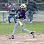 Will Rankin singles for Oak Harbor. (Photo by Jim Waller/Whidbey News-Times)