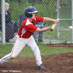 Sage Sharp puts down a bunt for Coupeville. (Photo by John Fisken)