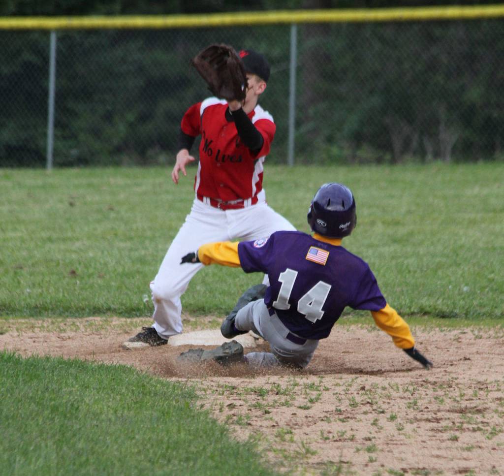 Kaito White steals second base as Coupeville&rsquo;s Scott Hilborn waits for the throw. (Photo by Jim Waller/Whidbey News-Times)