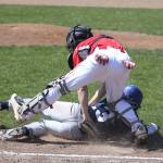 Coupeville catcher Matt Hilborn tags a Mount Vernon runner. (Photo by John Fisken)