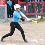 Melody Wilkie smacks a fly ball Wednesday. (Photo by John Fisken)
