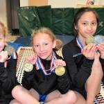 Ground Zero&rsquo;s Allison Lovett, left, Heidi Mullans and Kaia Crebbin are all smiles and medals after competing in the regional tournament in Las Vegas. (Submitted photo)