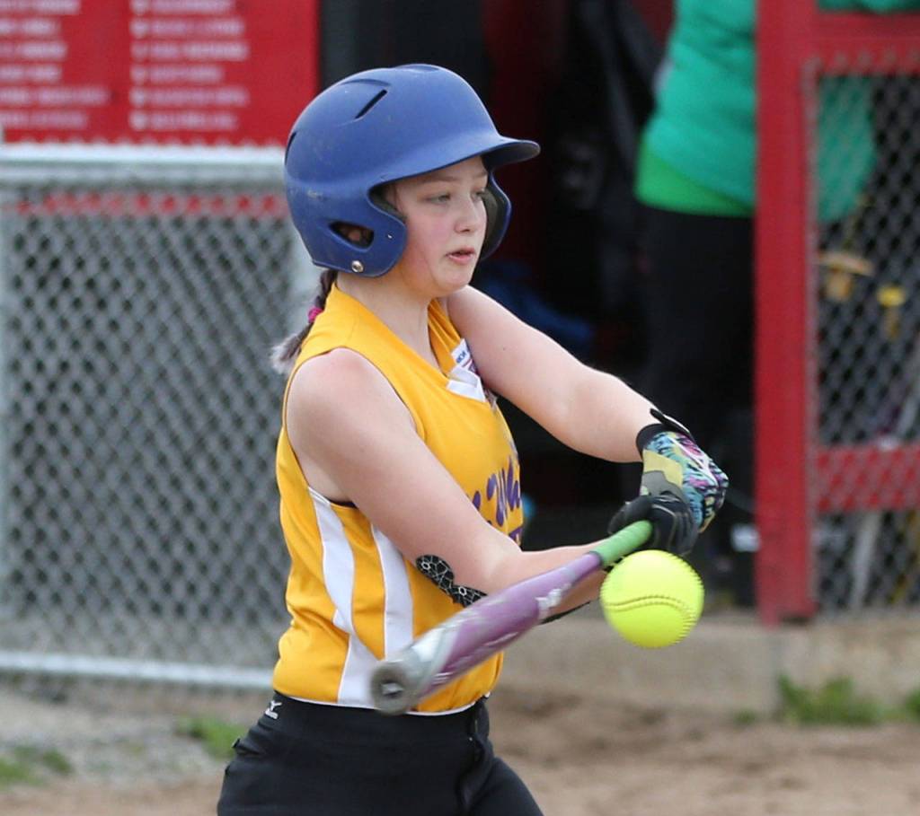 Loralai Snyder puts the bat on the ball. (Photo by John Fisken)