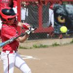Senior Jae LeVine goes after a pitch in her final home game. (Photo by John Fisken)