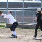 Taylor Wilson takes a throw that forces out Getchell&rsquo;s Avery Holscher. (Photo by John Fisken)