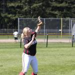 Tiffany Briscoe settles under a fly ball in the district tourament Saturday. (Photo by John Fisken)