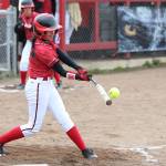 Robin Cedillo put the ball in play for the Wolves. (Photo by John Fisken)