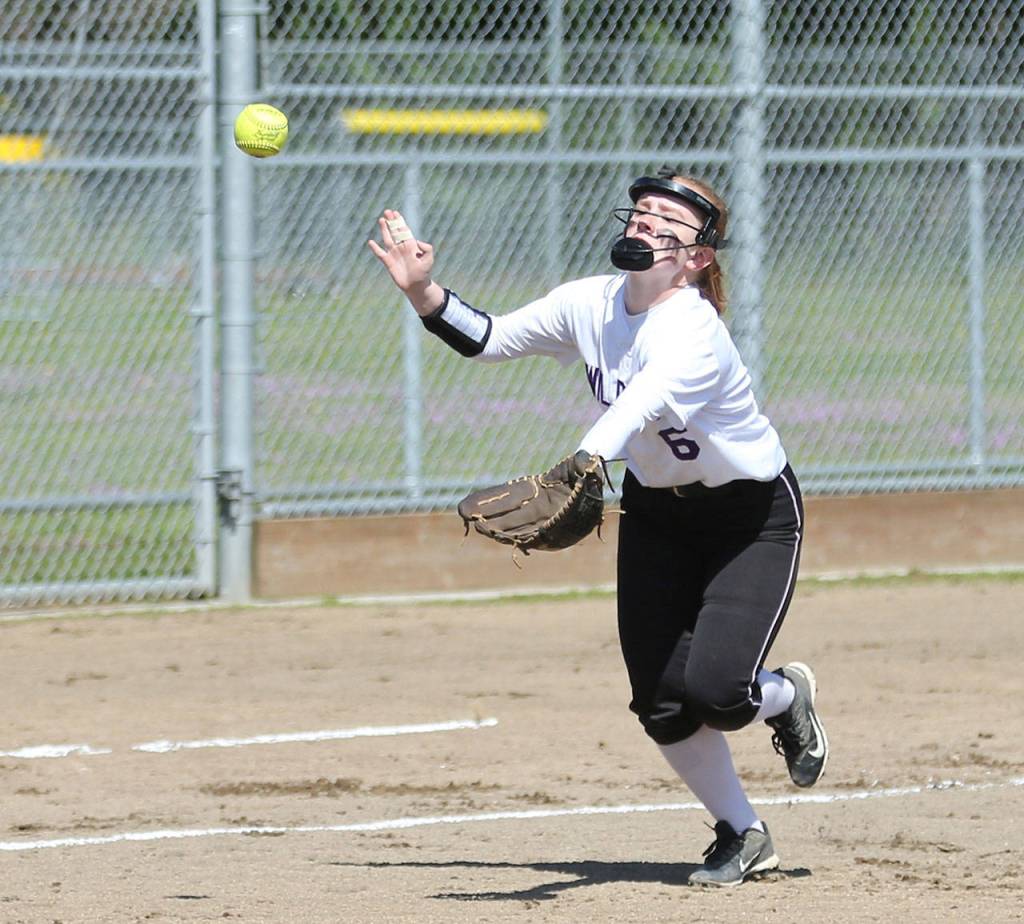 Third baseman Brooke Gilham races in to catch a blooper. (Photo by John Fisken)