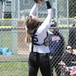 Kait Scheer settles under a pop-up for an out. (Photo by John Fisken)