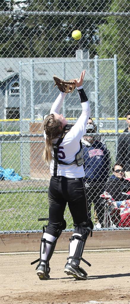 Kait Scheer settles under a pop-up for an out. (Photo by John Fisken)