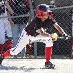 Tamika Nastali bunts for Coupeville Saturday. (Photo by John Fisken)