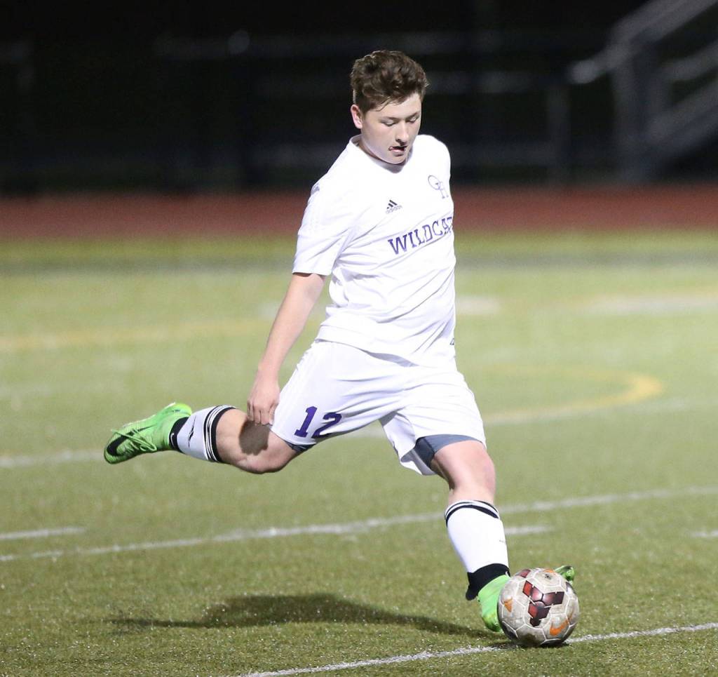 Chaz Purdy takes a free kick for Oak Harbor. (Photo by John Fisken)