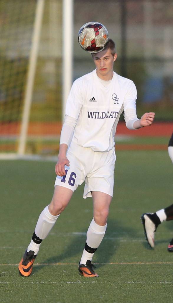 Kurtis Zylstra heads the ball in Monday&rsquo;s win over Terrace. (Photo by John Fisken)