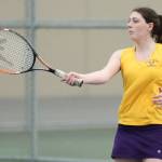Emily Brown returns a shot in her first doubles win Tuesday. (Photo by John Fisken)