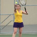 Maddie McKenzie serves for Oak Harbor in the Getchell match Tuesday. (Photo by John Fisken)