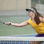 Emma Wezeman hits a shot in first doubles in the win over Marysville Getchell. (Photo by John Fisken)
