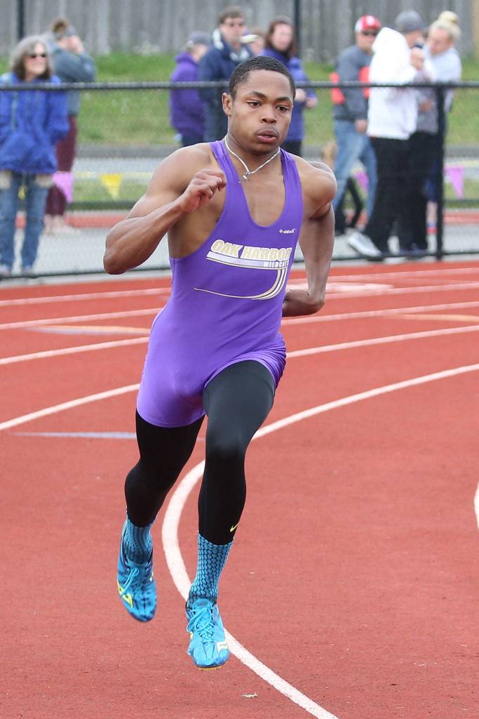Chris Brown heads around the second turn in the 400-meter preliminaries. (Photo by John Fisken)