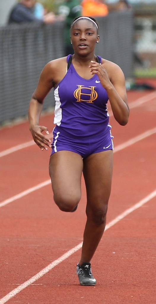 Delija Cammon sprints to the finish in the JV 100 meters. (Photo by John Fisken)