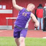 Justin Campbell competes in the shot put for Oak Harbor. (Photo by John Fisken)