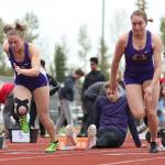 Kaitlyn Chelberg, left, and Samantha Hines take off in the 100 hurdles. Chelberg finished third and Hines sixth. (Photo by John Fisken)