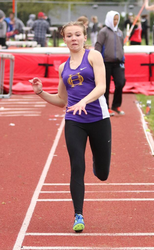 Autumn Coker gets ready to launch in the long jump. (Photo by John Fisken)