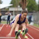 Jenna Cooley flies to sixth place in the long jump. (Photo by John Fisken)